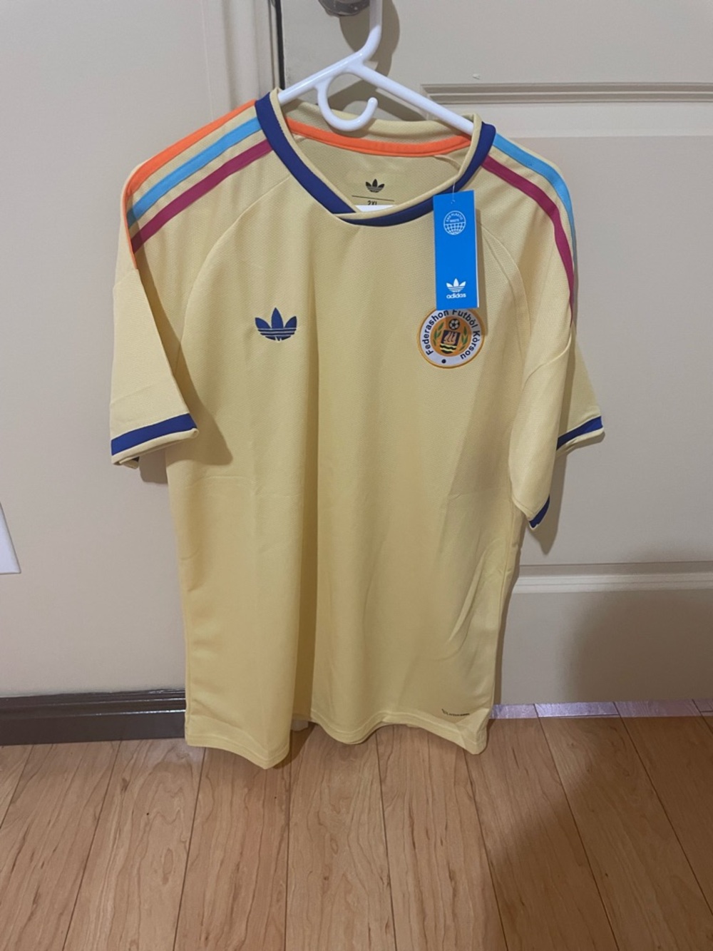 Curacao adidas Pale Yellow Tee with Multicolor Shoulder Stripes